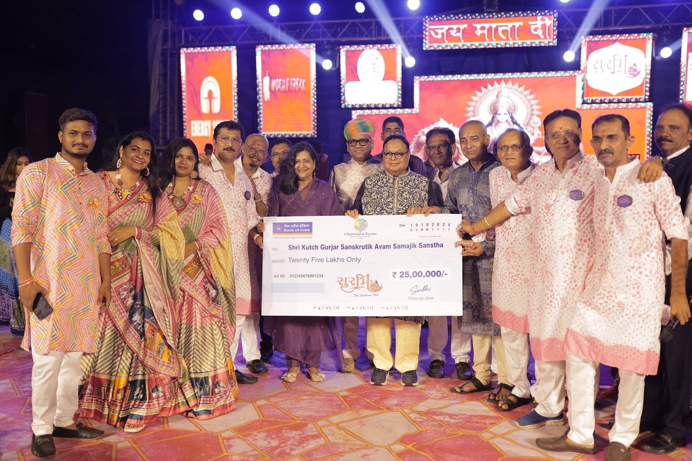 Seva hi Dharam at Surbhi Navratri Garba, Chattarpur Farms Nagpur: charity cheque handover